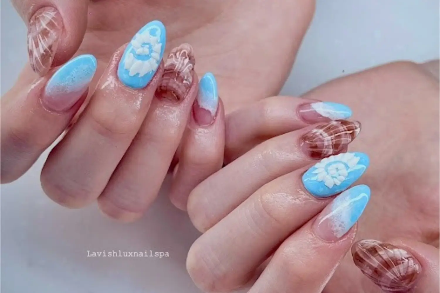 Woman receiving acrylic nail treatment at Lavish Lux Nail Spa in Mississauga