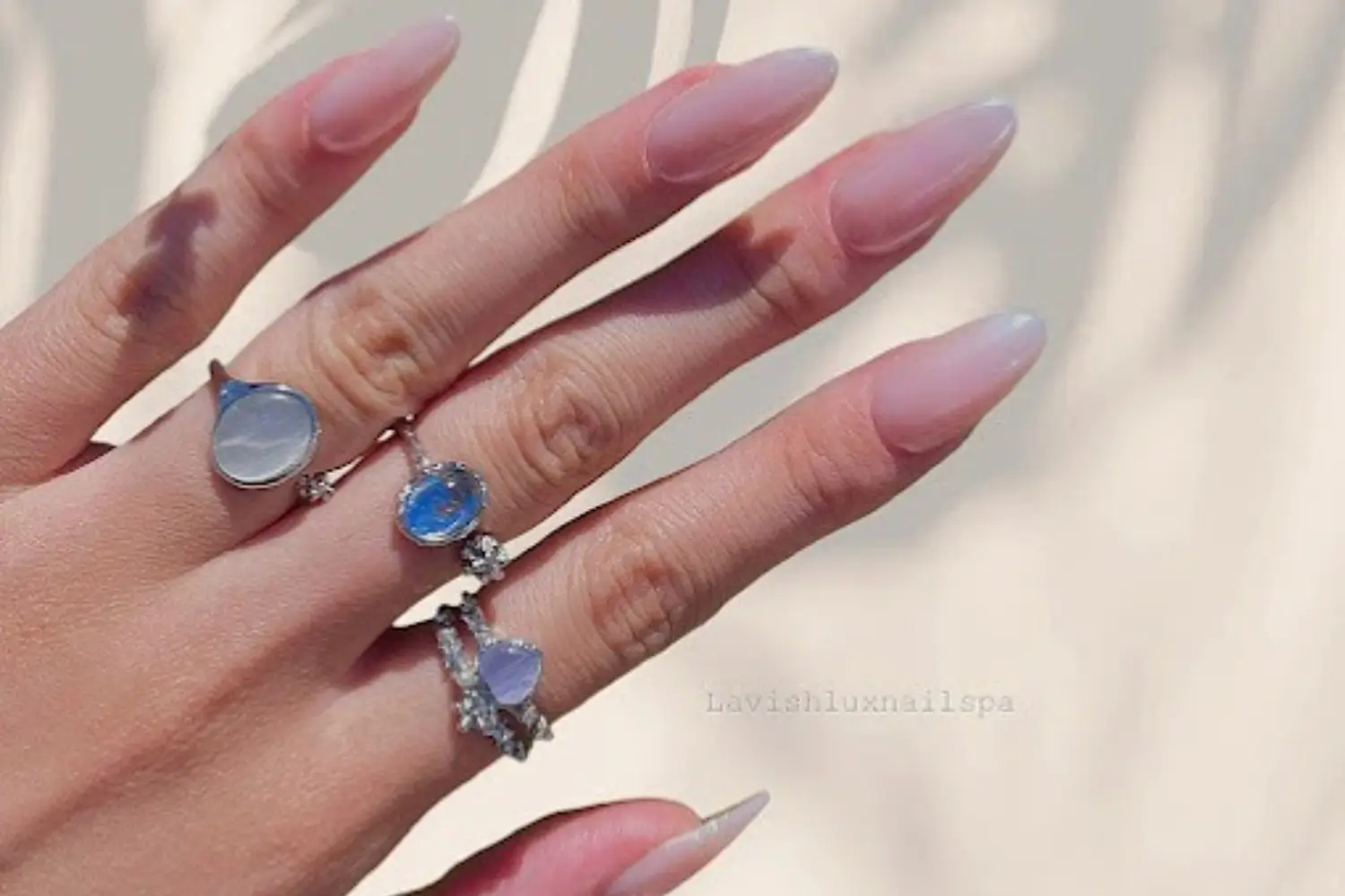 Elegant acrylic nails with intricate designs at Lavish Lux Nail Spa in Mississauga.